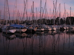 SX24535 Sunset over sailboats in marina at Brouwershaven.jpg